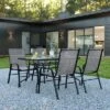 Emma And Oliver Five Piece Patio Table Set With Metal Table With Tempered Glass Top And 4 Flex Comfort Stacking Chairs
