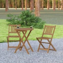 Emma And Oliver All-Weather Three Piece Solid Acacia Wood Patio Bistro Set With Two Folding Chairs And Table